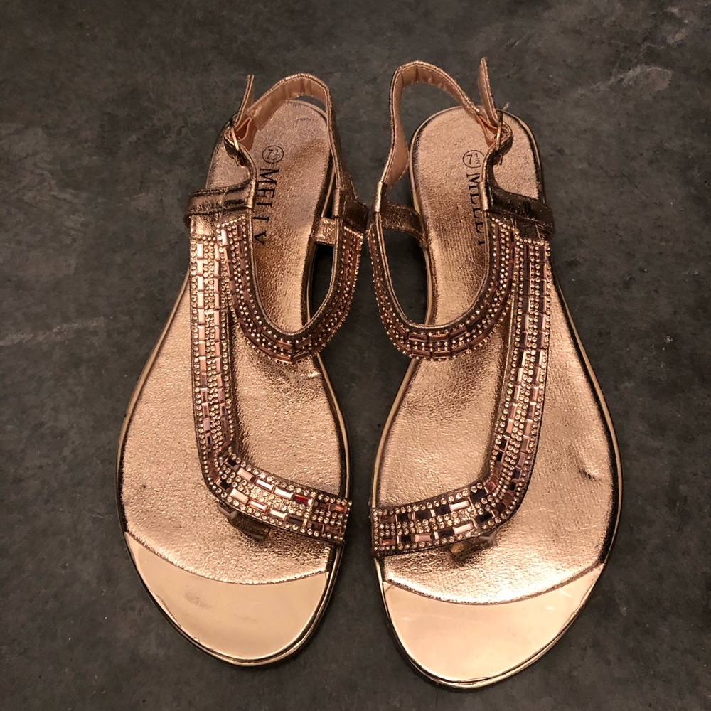 Bronze sandals with bead embellishments